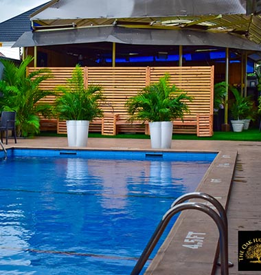 Pool Side Bar and Swimming Pool — Oak Haven Hotel
