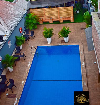 Pool Side Bar and Swimming Pool — Oak Haven Hotel